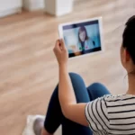 young-woman-having-a-video-conference-with-her-doc-ipad